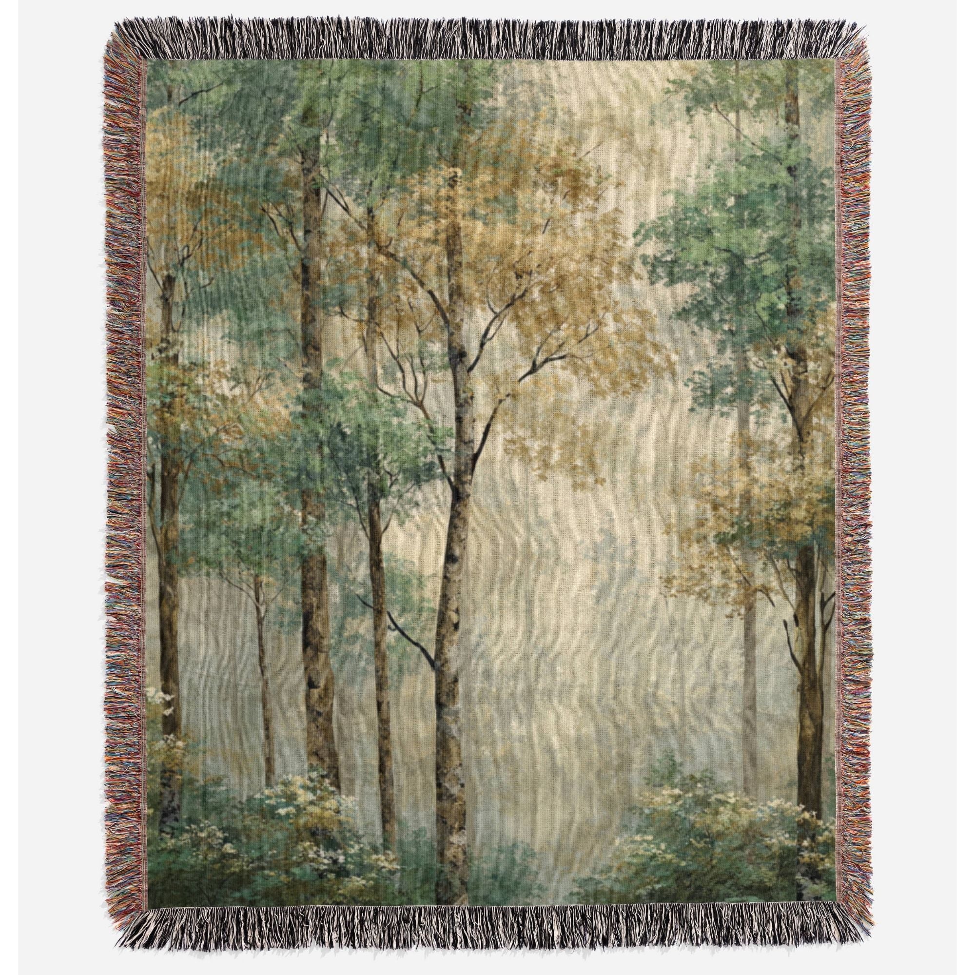 a blanket with a forest scene on it