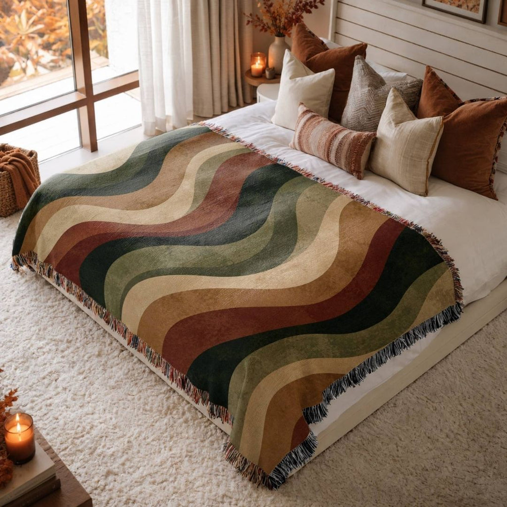 Autumn Current jacquard woven blanket on a queen bed