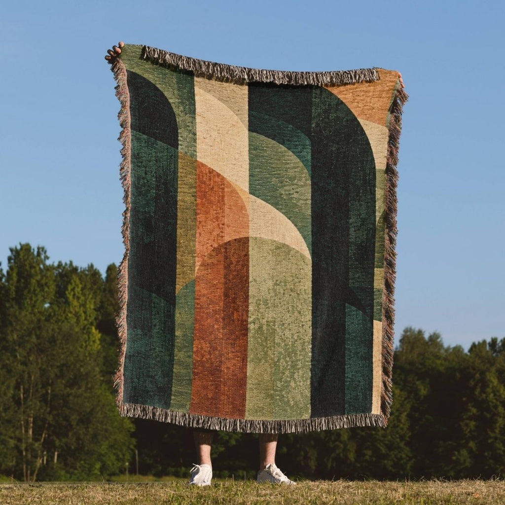 Earthbound Curves woven throw blanket outdoors