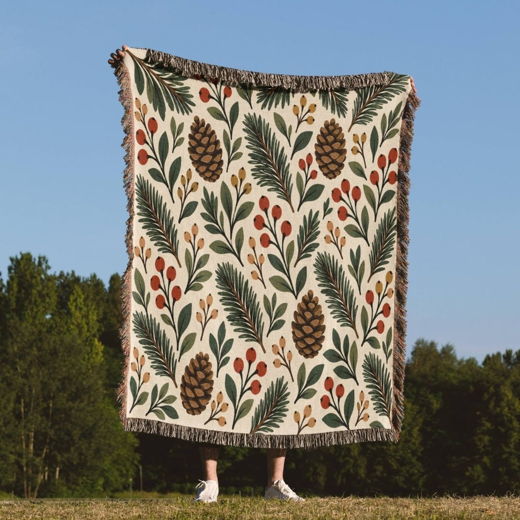 Evergreen & Berries woven throw blanket outdoors