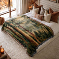 Forest Tapestry jacquard woven blanket on a queen bed