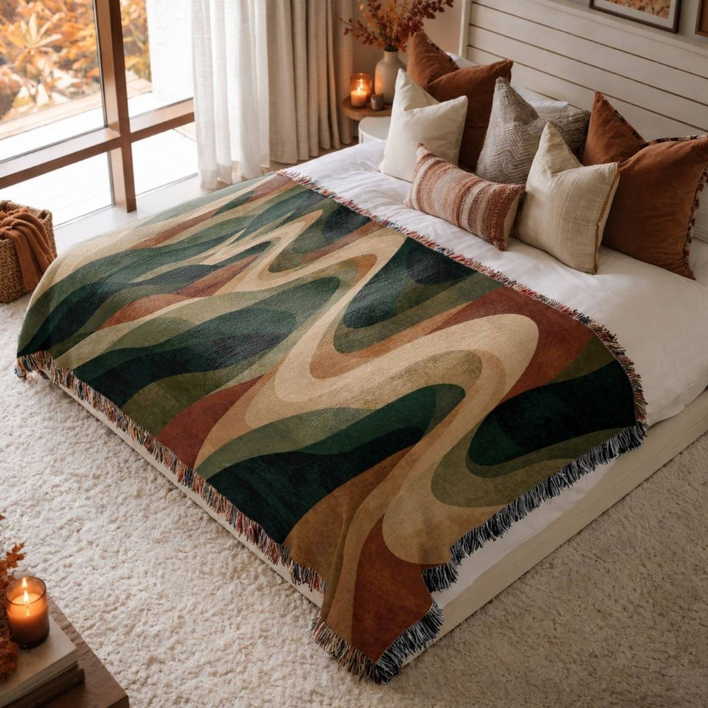 Forest Waves jacquard woven blanket on a queen bed