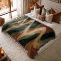 Forest Waves jacquard woven blanket on a queen bed