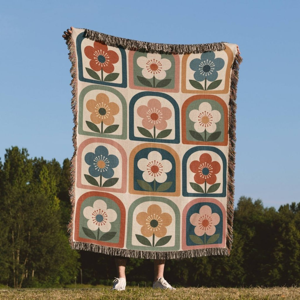 Framed Flora woven throw blanket outdoors