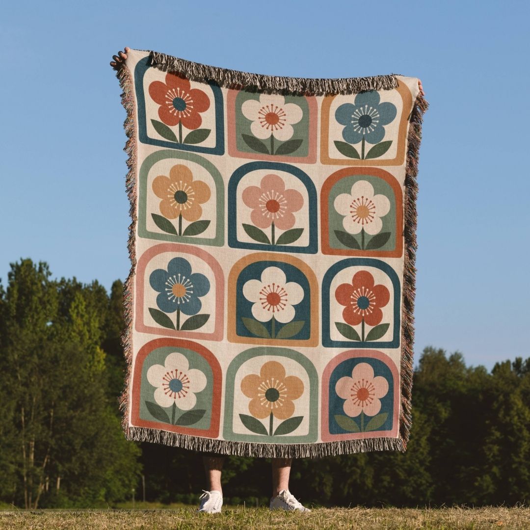 Framed Flora woven throw blanket outdoors