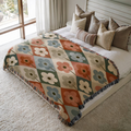 Garden Diamonds jacquard woven blanket on a queen bed