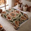 Harvest Medallion jacquard woven blanket on a queen bed