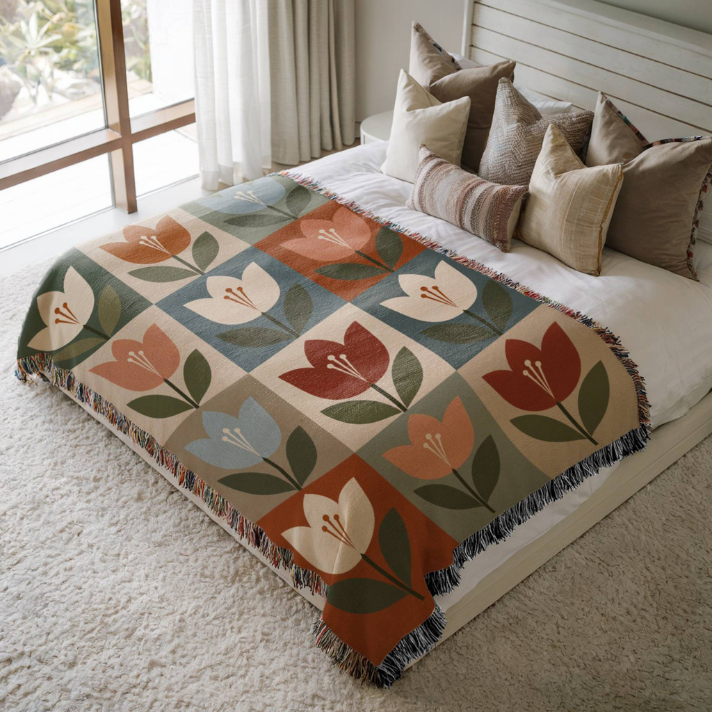 Minimalist Tulips jacquard woven blanket on a queen bed