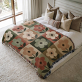 Vintage Petals jacquard woven blanket on a queen bed